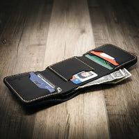Trinity western trifold wallet in walnut brown leather, featuring intricate stitching and a subtle embossed logo.
