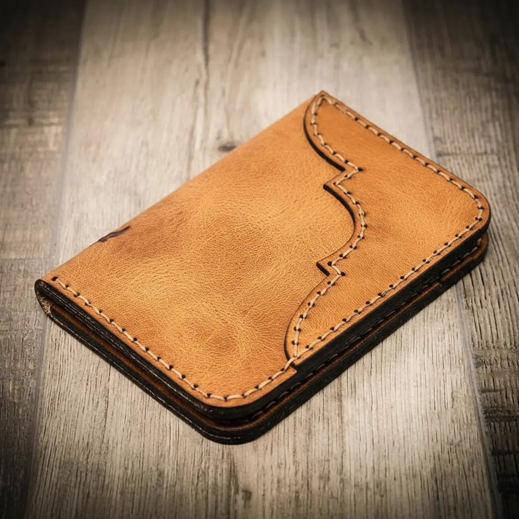 Saddle tan leather wallet, western vertical style, handmade in Texas by Bull Sheath Leather.
